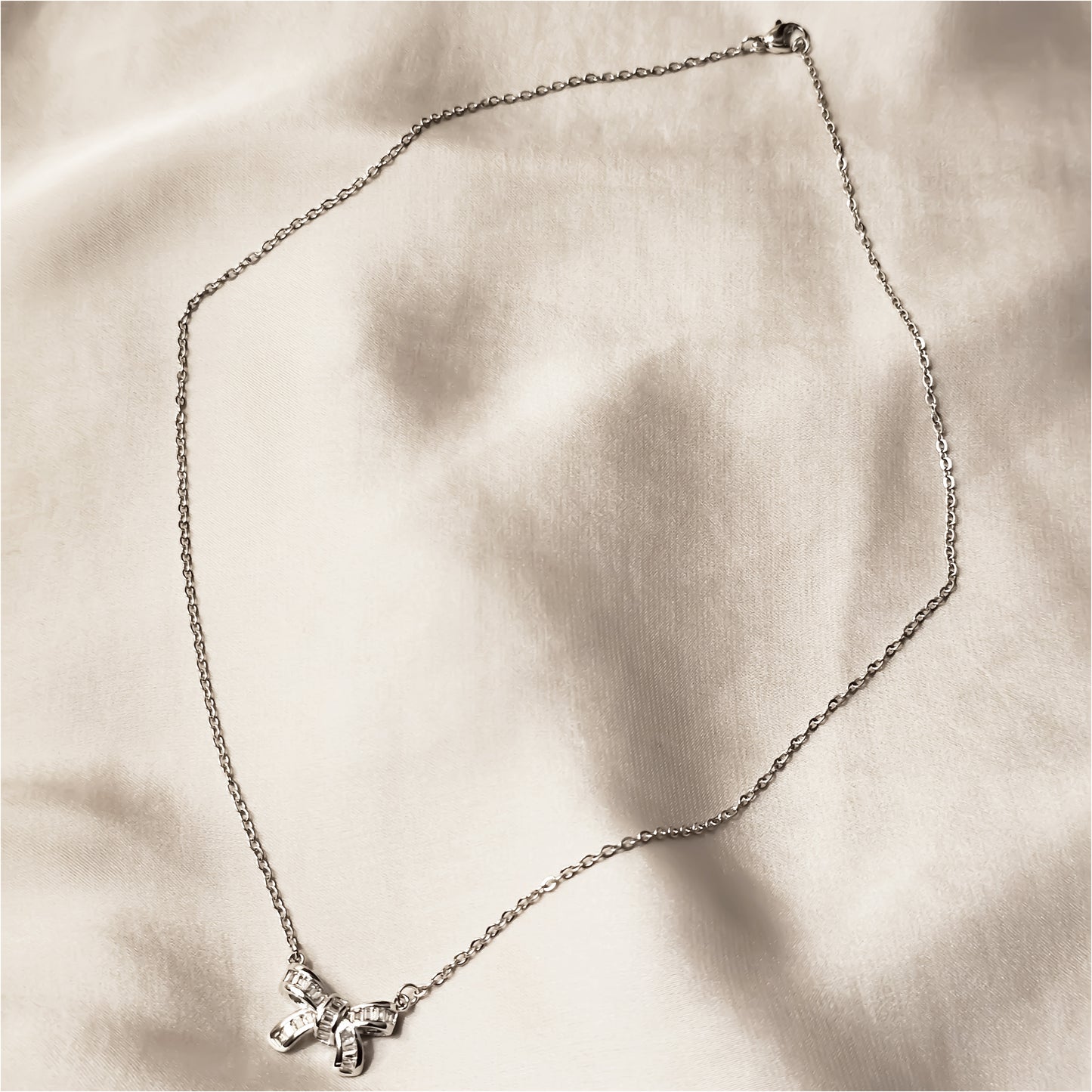 Huitan Bow Shaped Sterling Silver Pendant