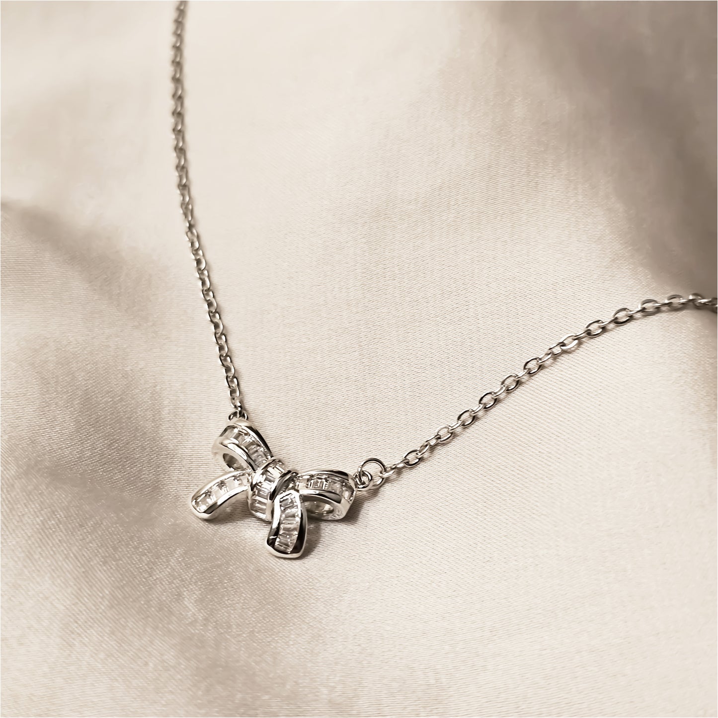 Huitan Bow Shaped Sterling Silver Pendant