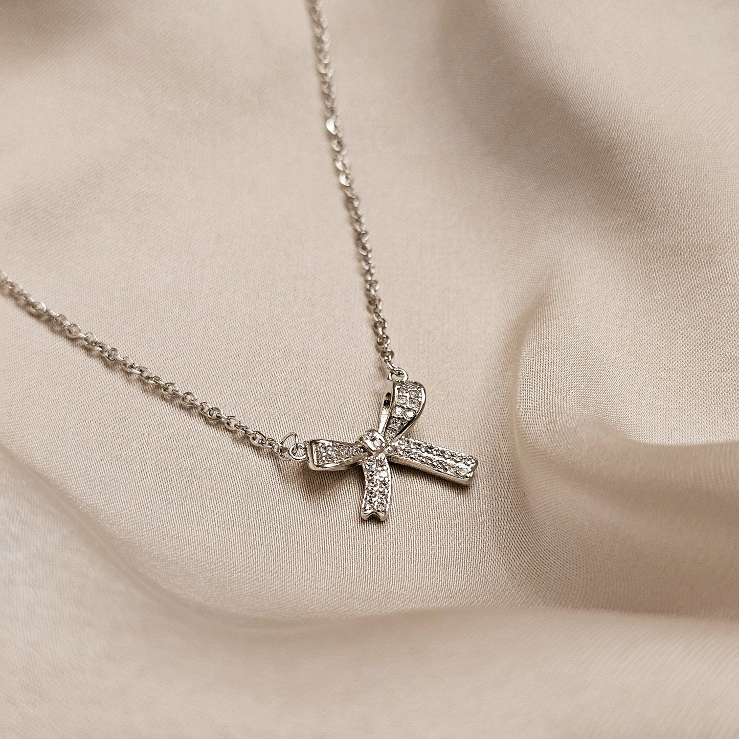 Fashionable Crystal Bowknot Pendant Necklace Stainless Steel
