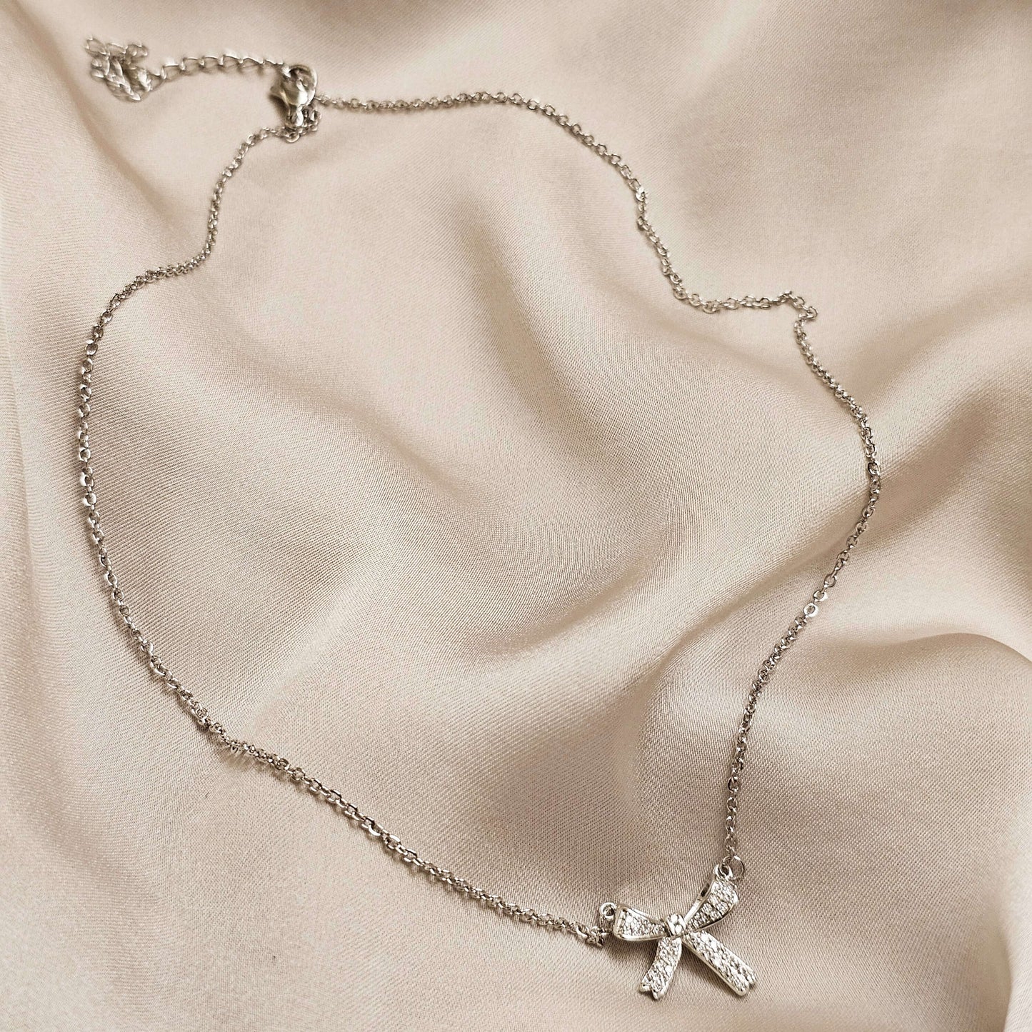 Fashionable Crystal Bowknot Pendant Necklace Stainless Steel