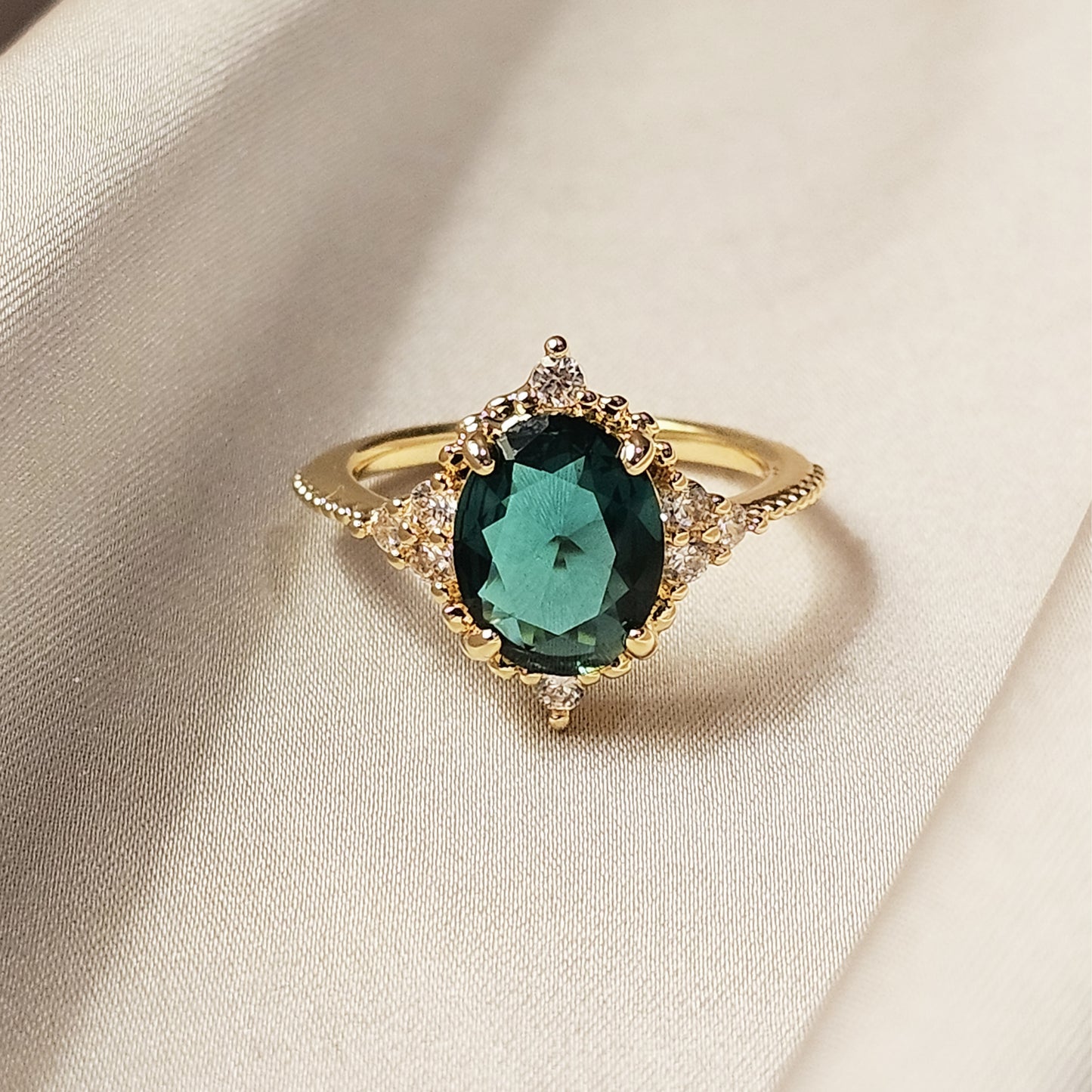 Oval Cut Emerald Engagement Ring