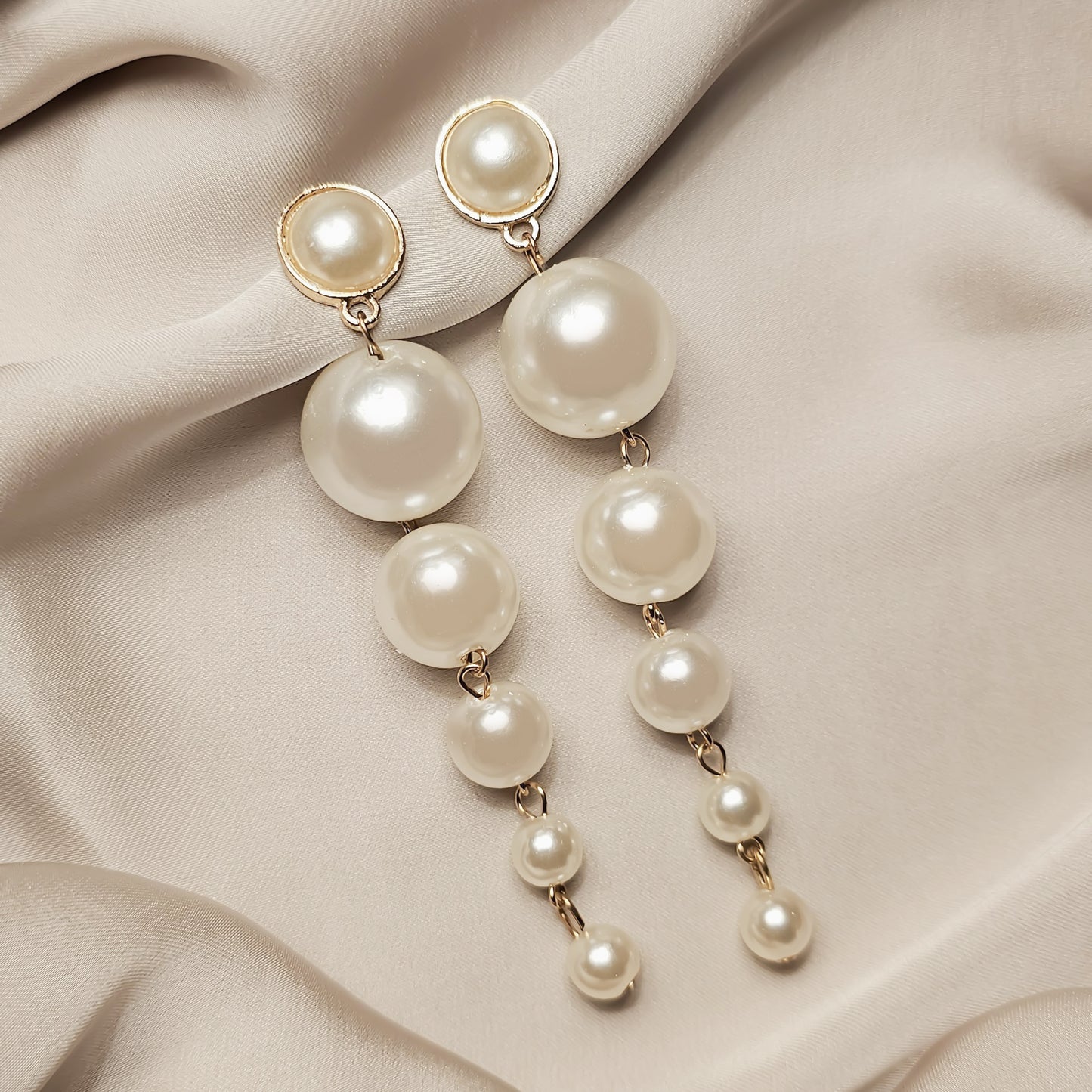 Simulated pearl earrings