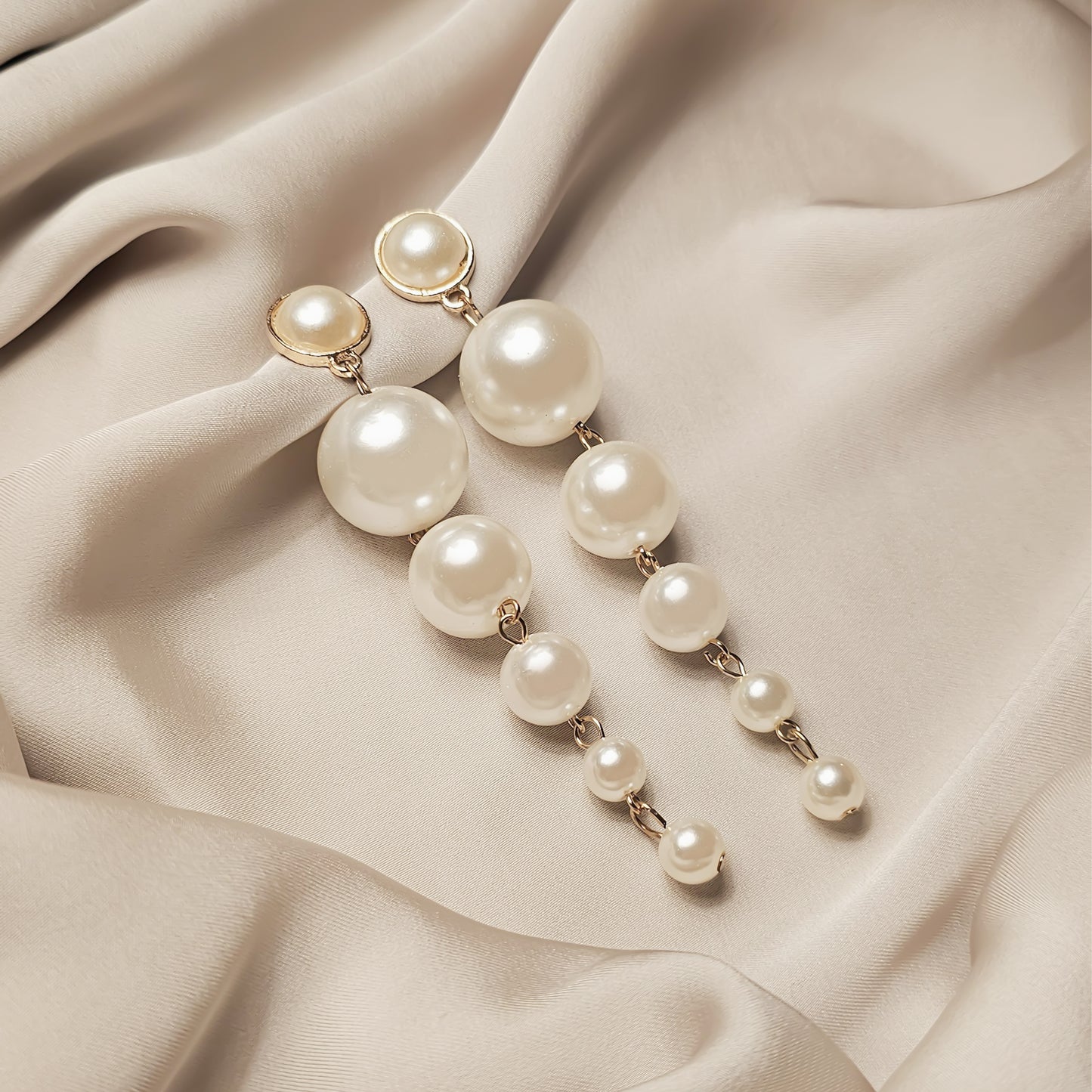Simulated pearl earrings