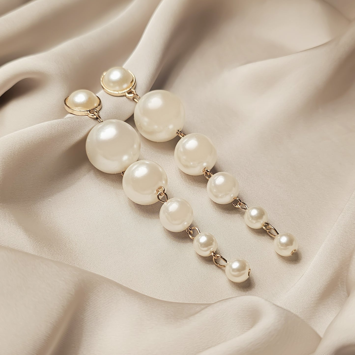 Simulated pearl earrings