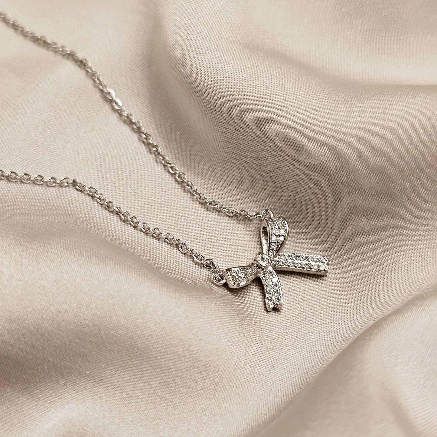 Fashionable Crystal Bowknot Pendant Necklace Stainless Steel - FAH Jewelry