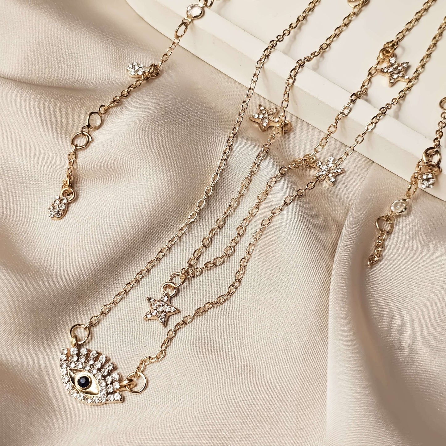 Golden crystal greek eye + star drop necklace - FAH Jewelry