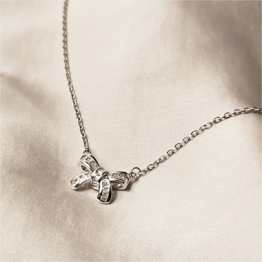 Huitan Bow Shaped Sterling Silver Pendant - FAH Jewelry